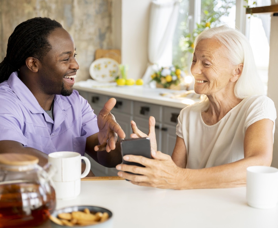 african-social-worker-helping-senior-woman