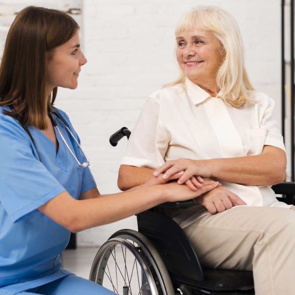 caregiver-taking-care-woman-wheelchair