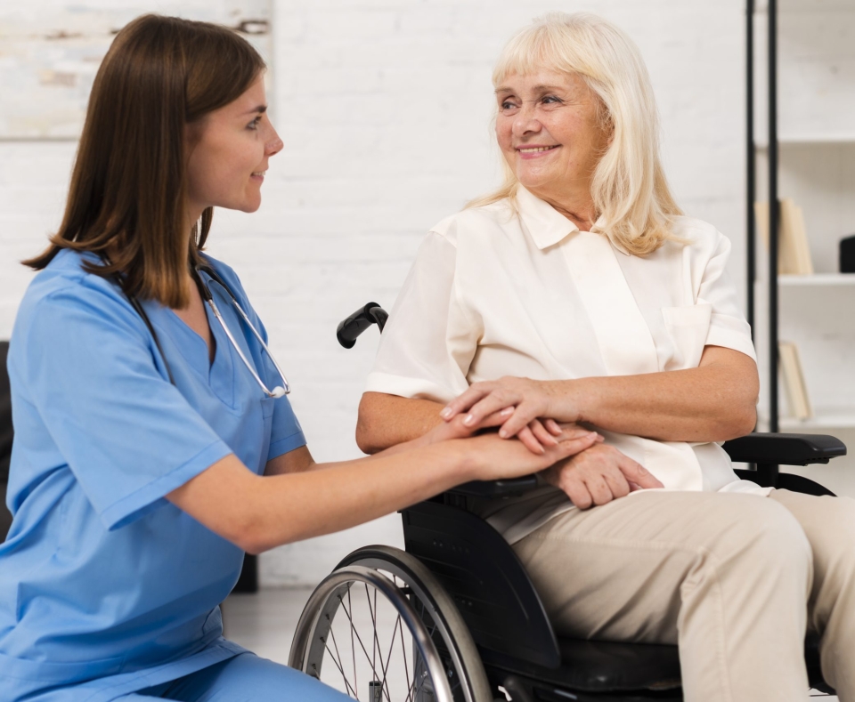 caregiver-taking-care-woman-wheelchair